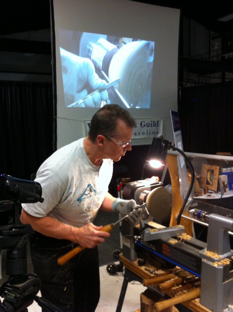 Craftsman using a lathe machine