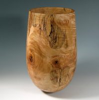 Tall wooden vase with unique textures